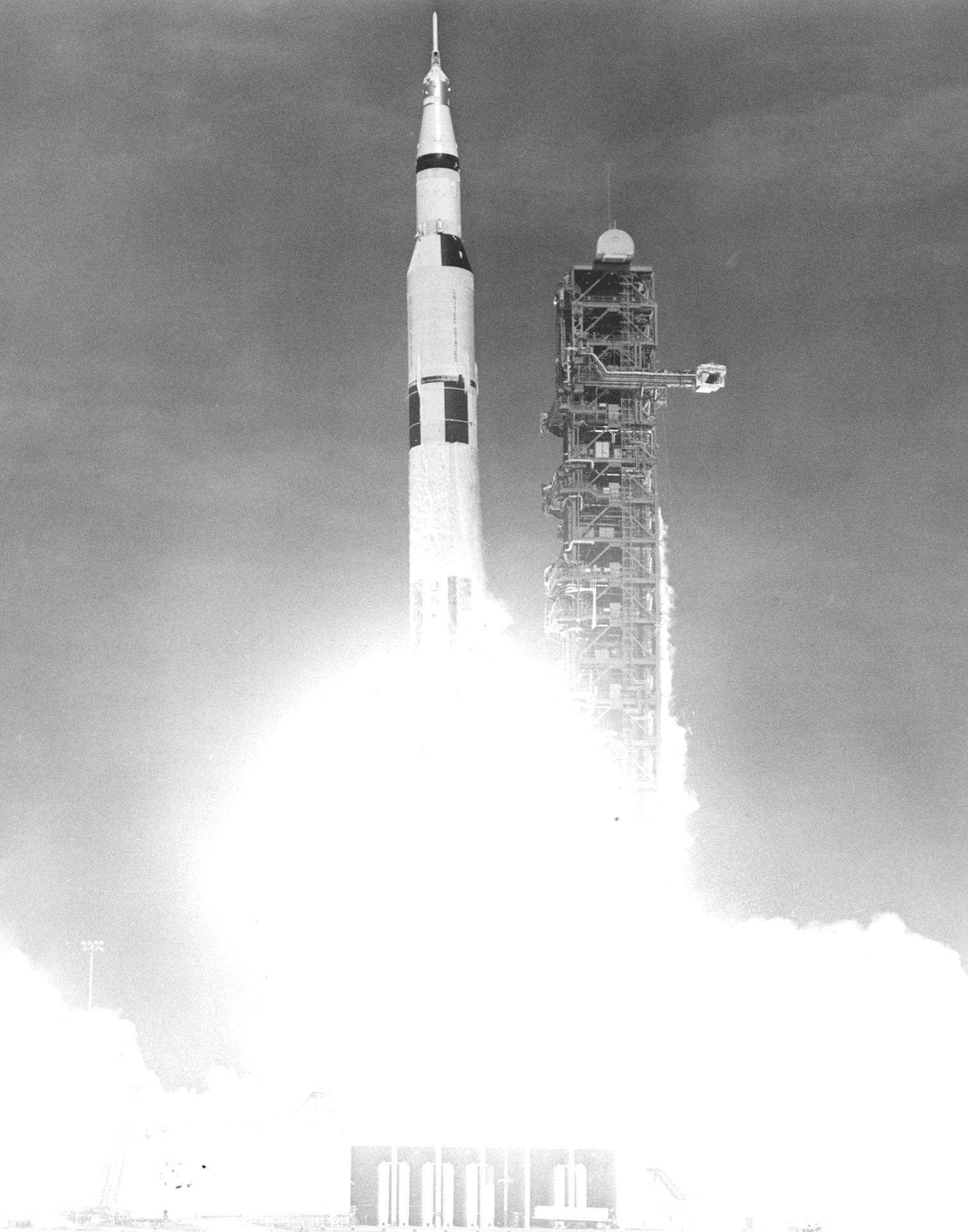 Apollo 11 lifting off from Launch Complex 39A on 16 July 1969, the Saturn V first stage at full thrust as the vehicle clears the tower.